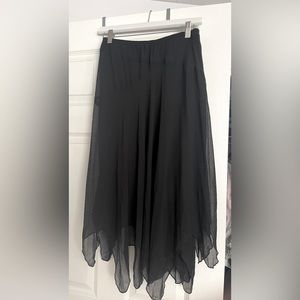 Black handkerchief hemline skirt Dress barn size M polyester fabric.